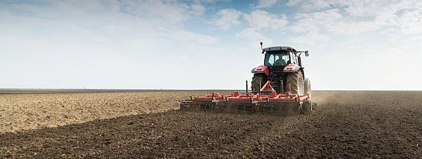 Tractor preparing land for sowing